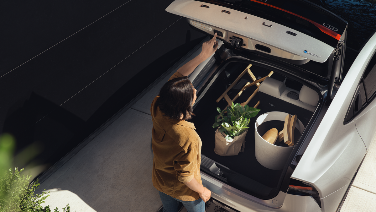 Open liftback of a 2027 Toyota Prius Limited with cargo loaded