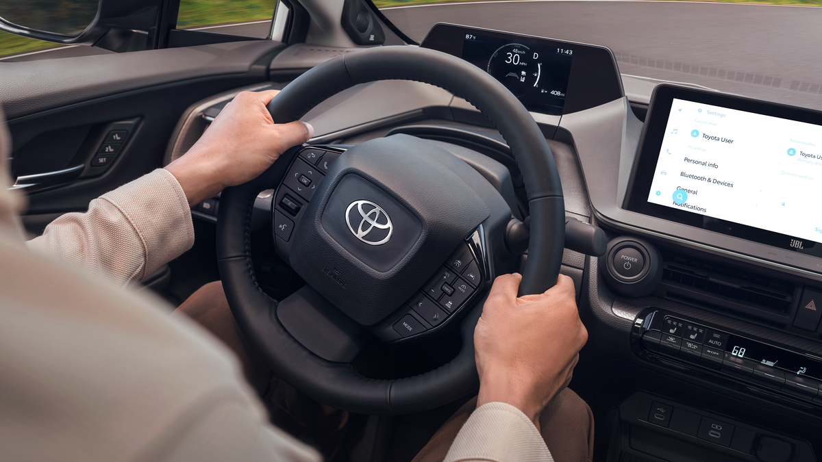 Driver's view of the 2027 Toyota Prius top-mounted display and steering wheel